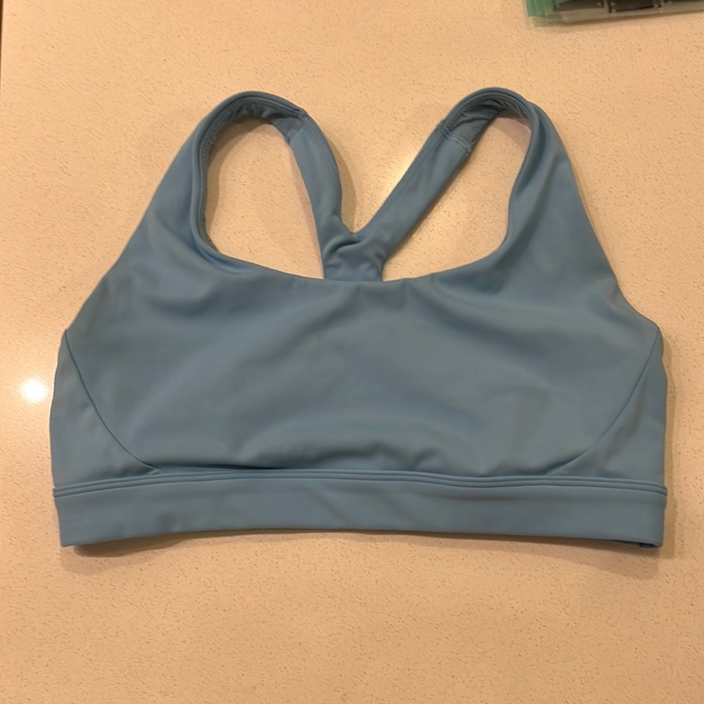 Excellent used condition sky blue Athleta sports bra size medium.